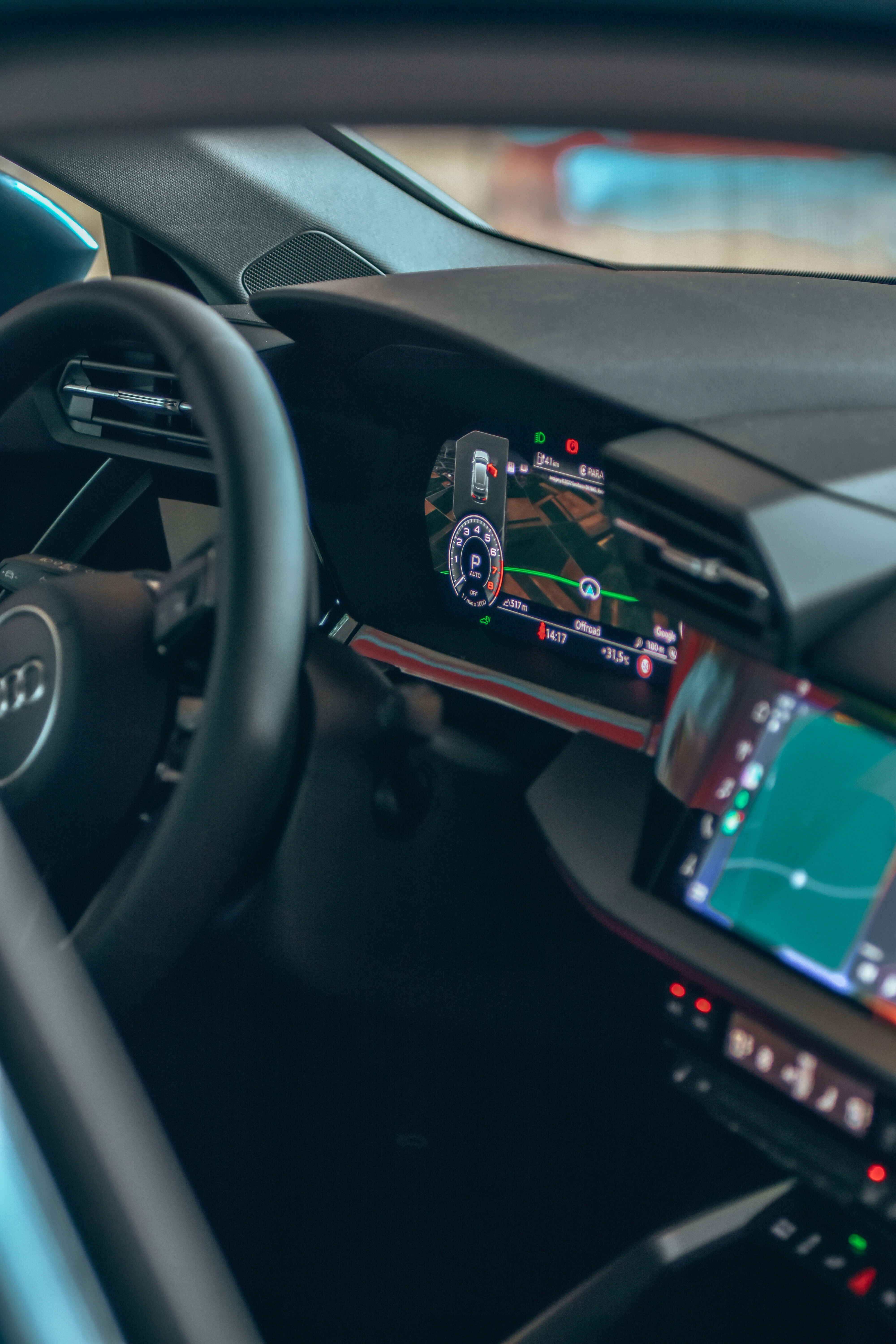 a car dashboard with a game controller