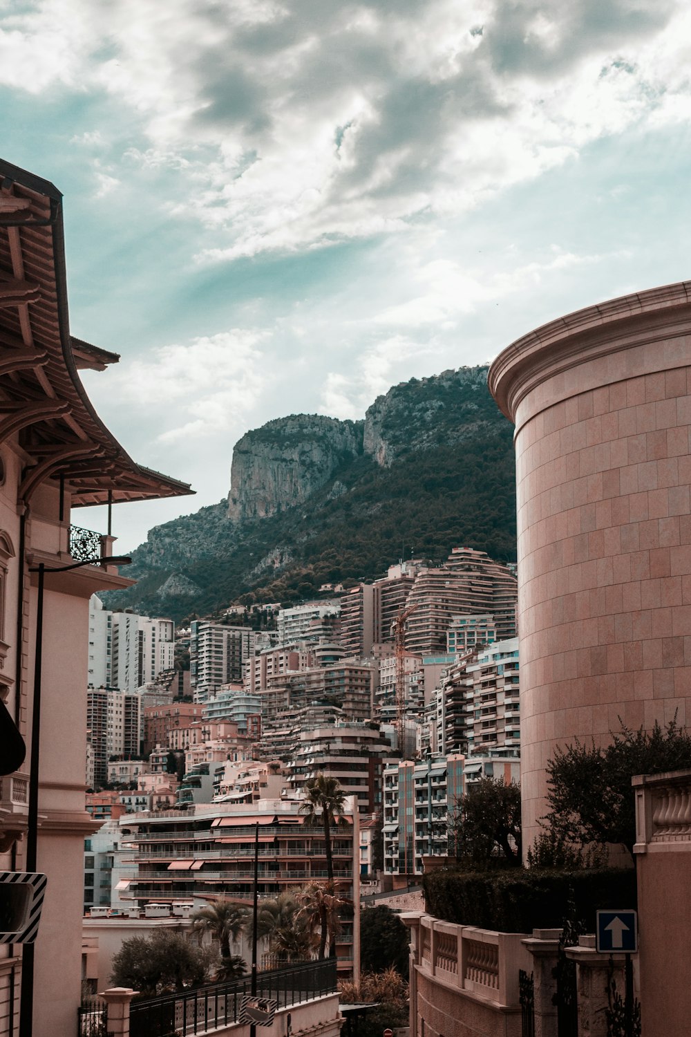 a city with a mountain in the background