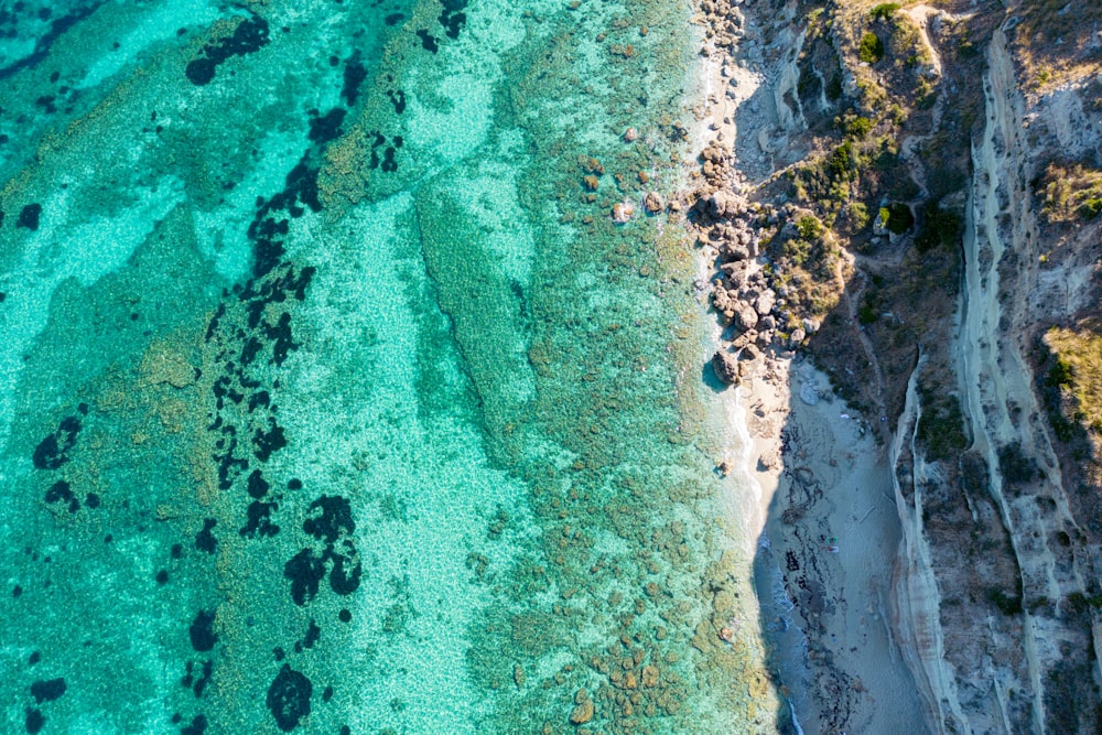 a body of water with land in the background