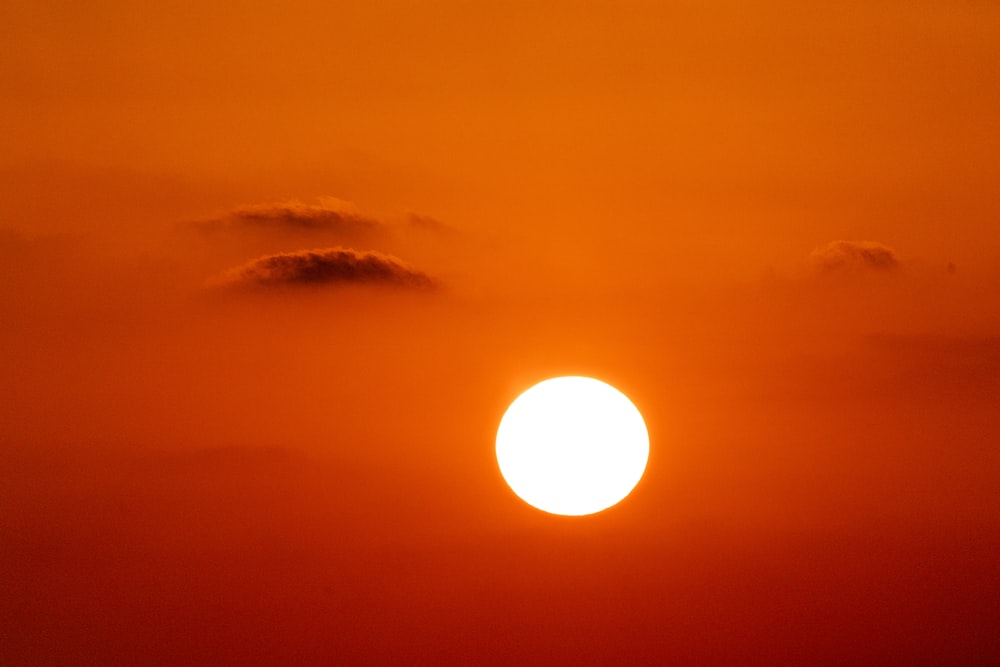 a sunset with clouds