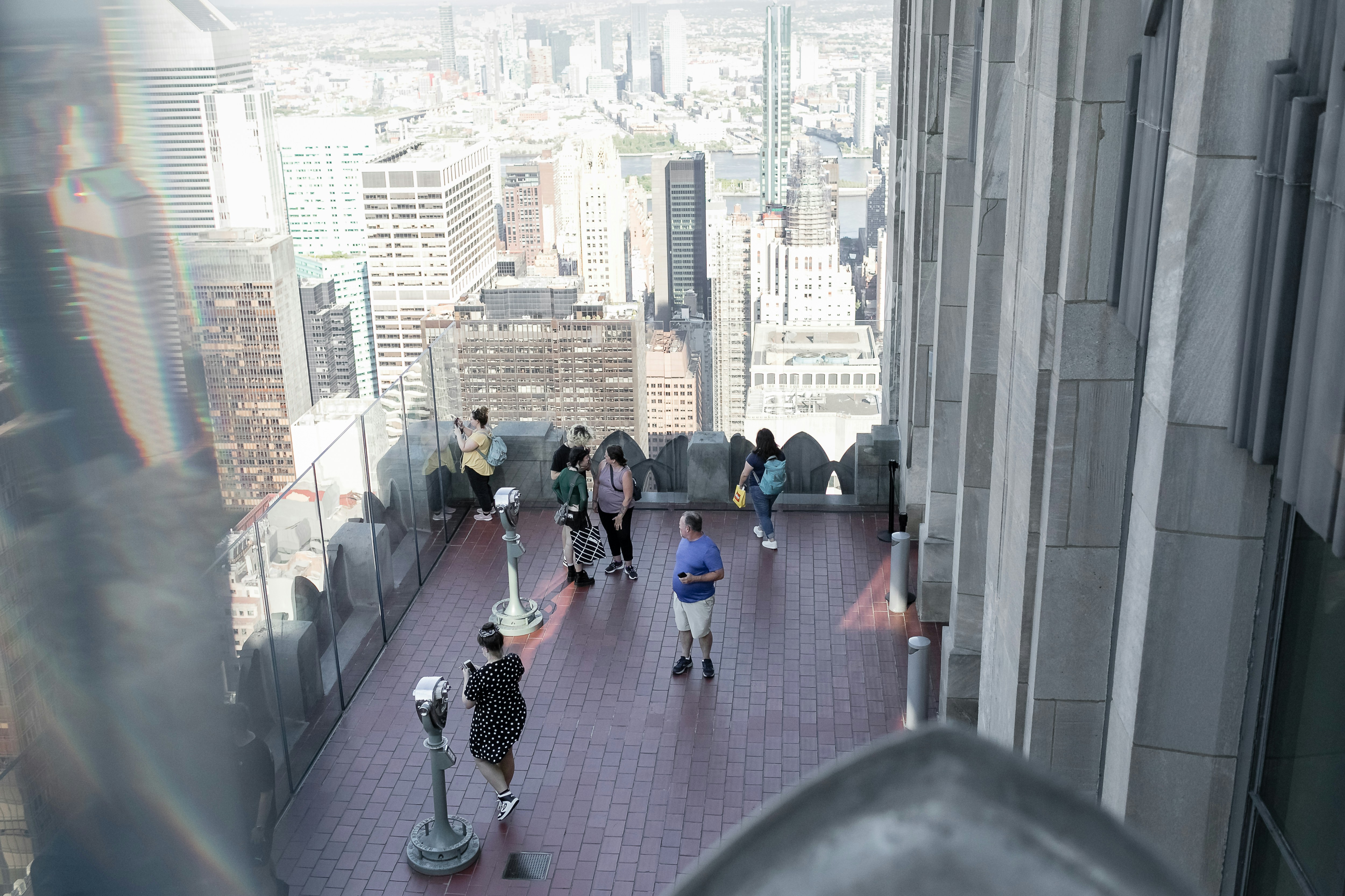 people walking on a sidewalk