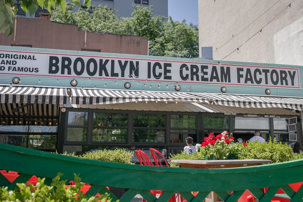 a restaurant with a sign