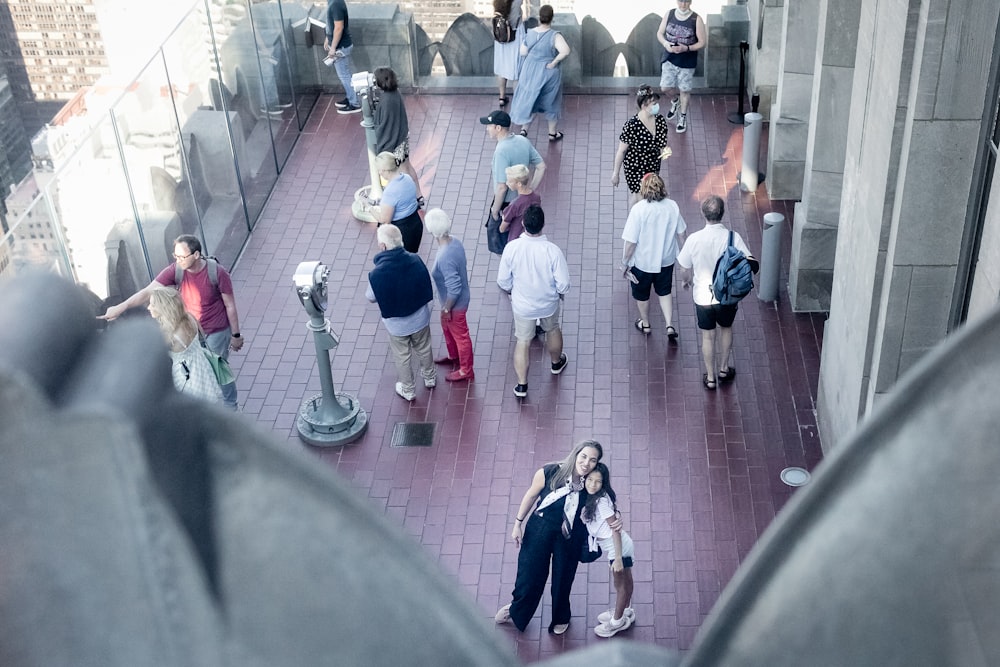 a group of people walking down a flight of stairs