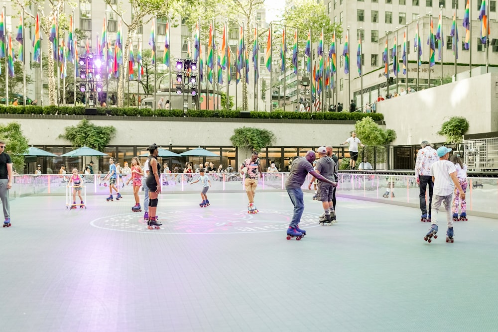 a group of people rollerblading