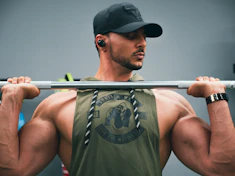 a man holding a bar