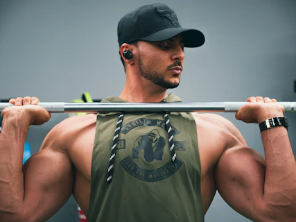 a man holding a bar