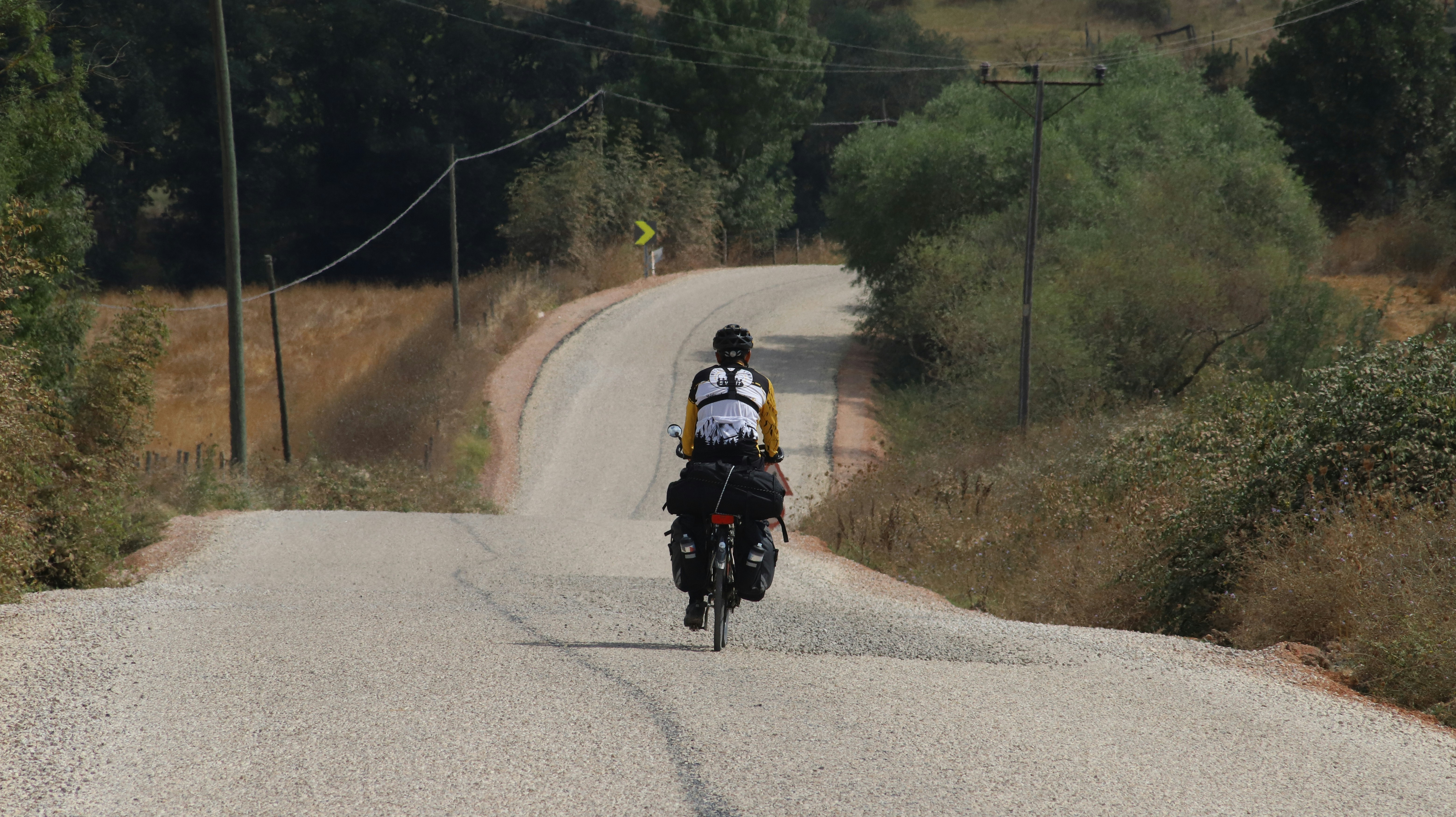 a person riding a motorcycle on a road