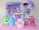 The setting displays a colorful children's party with a cartoon theme, featuring balloons in pastel colors like pink, purple, blue, and green. A large poster of a girl with pigtails is part of the backdrop, surrounded by more balloons and flowers. Various themed decorations and toys are arranged on tables, including cartoon characters, gift bags, and treat boxes. The room's bright and cheerful atmosphere is enhanced by a pink armchair and a vibrant pink rug.