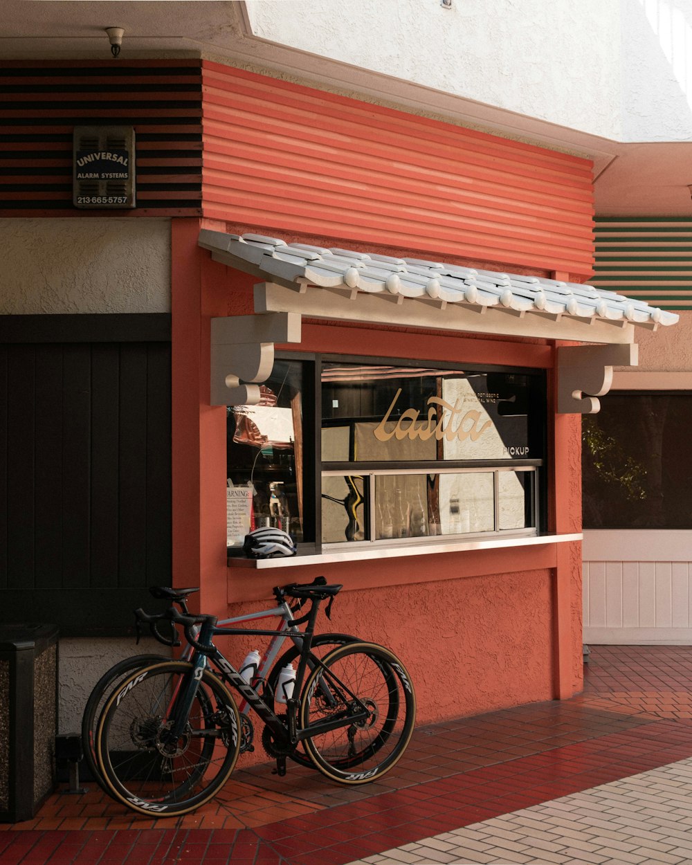 a bicycle parked outside a building