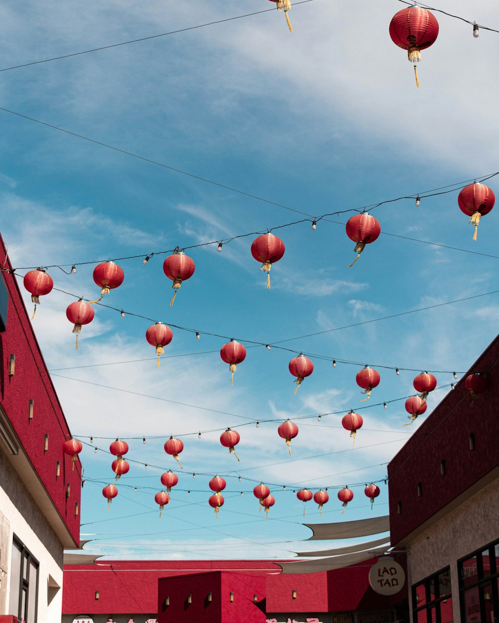 a group of red and white balloons