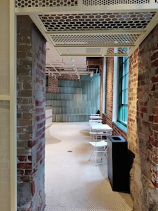 a room with a table and chairs