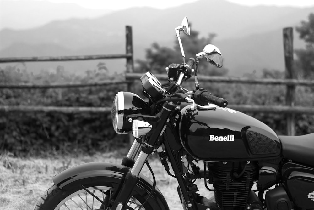 a motorcycle parked on a field