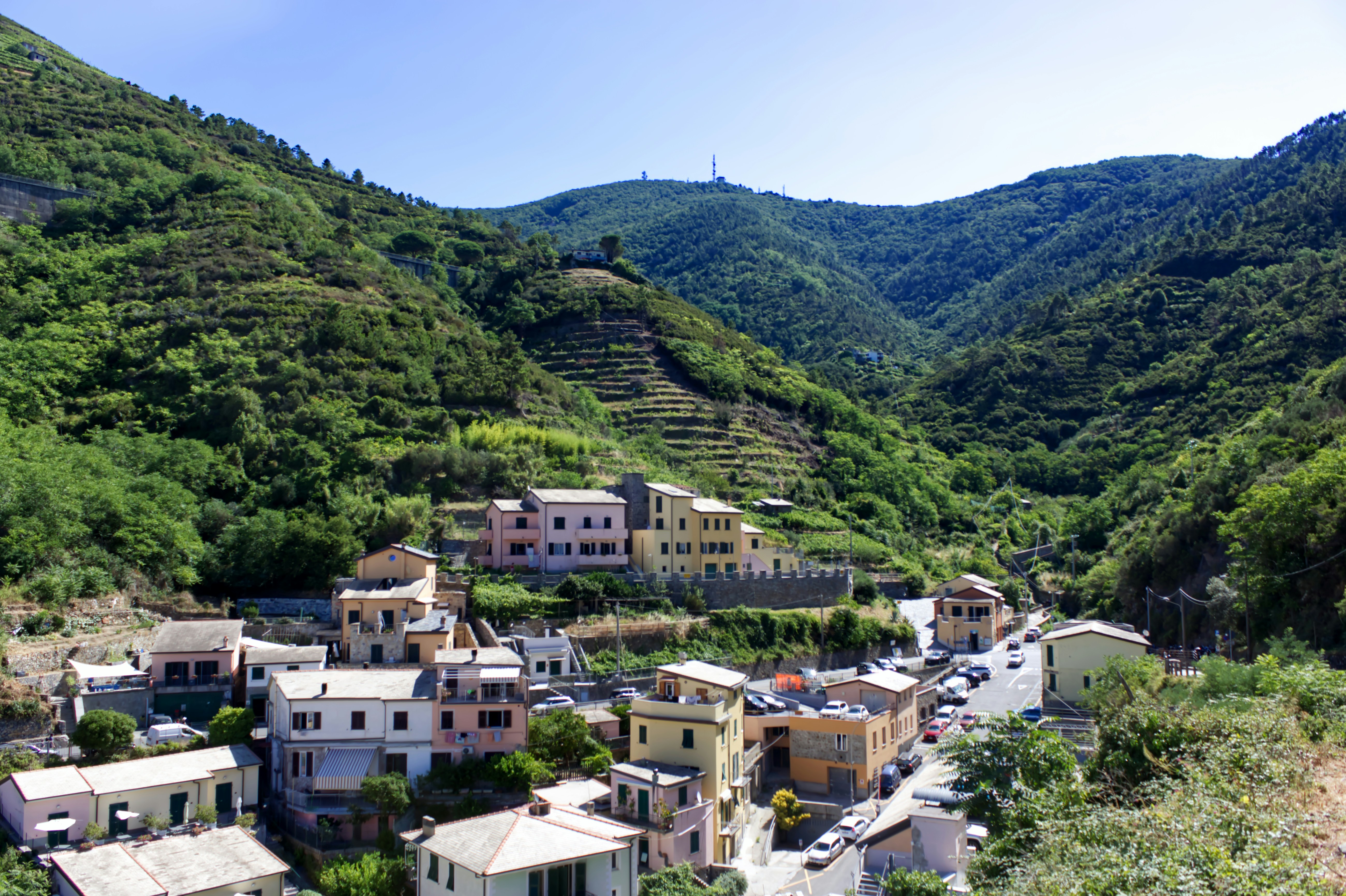 a group of buildings in a valley, 