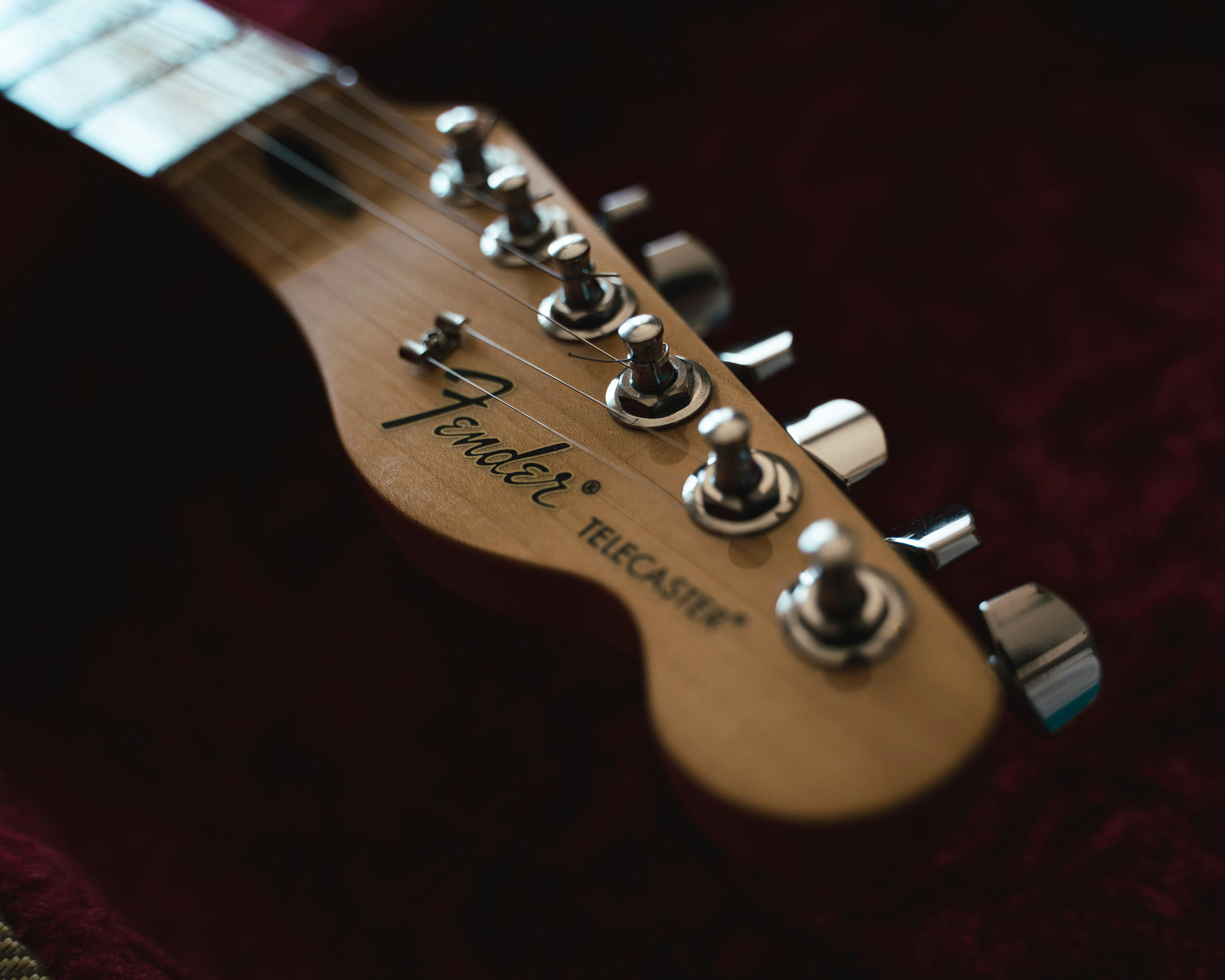 a guitar with a number of keys