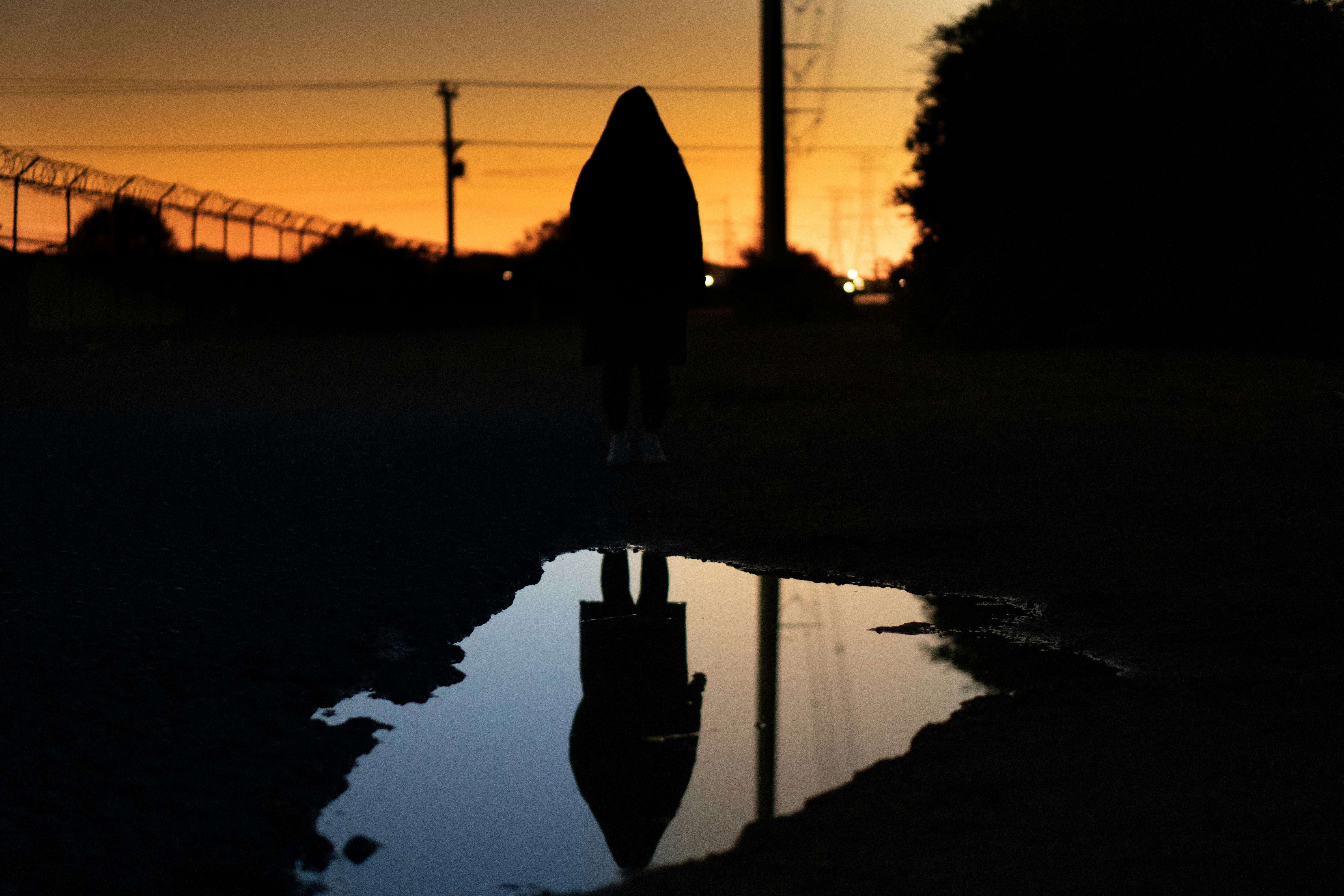 a person walking in the rain