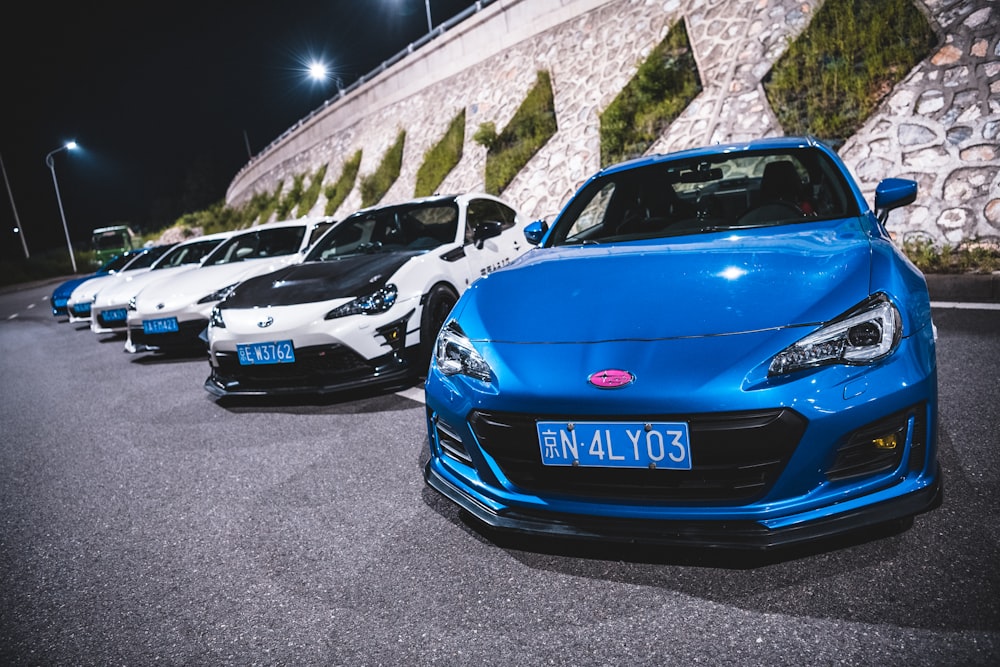 a group of cars parked on the side of a road