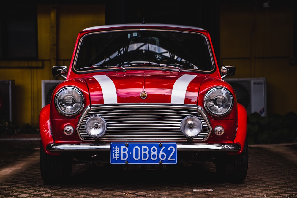 a red car parked in a garage