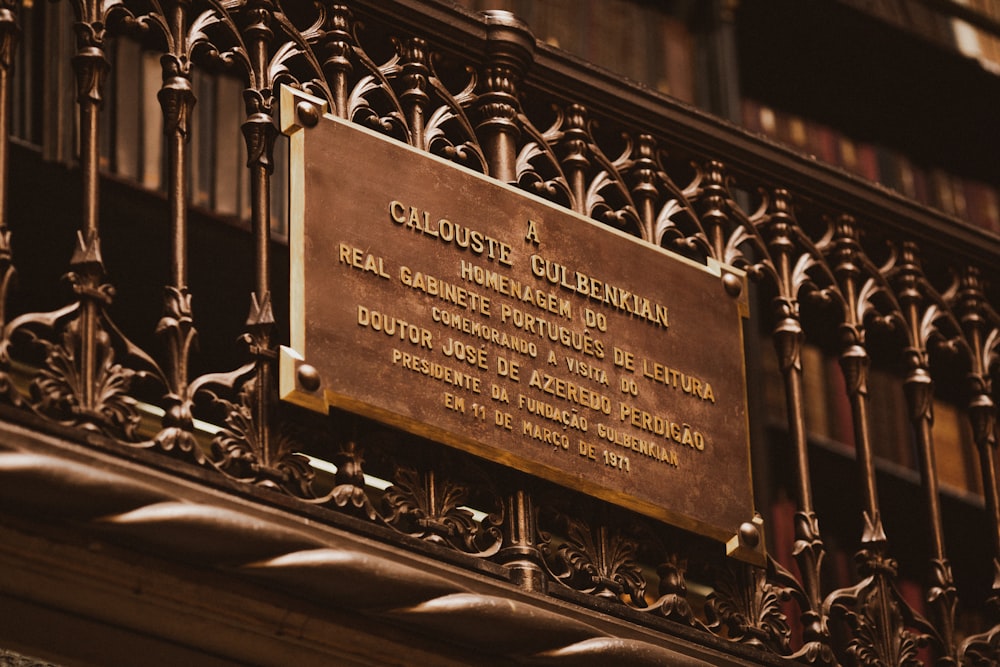 a gold plaque with writing on it