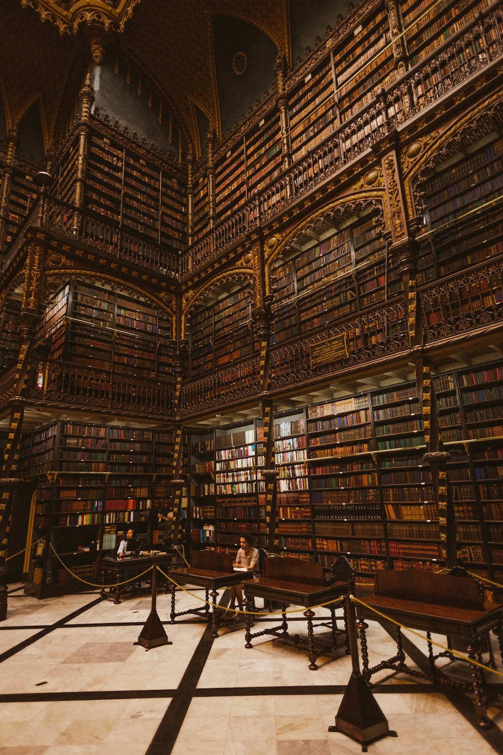 a large library with many bookshelves
