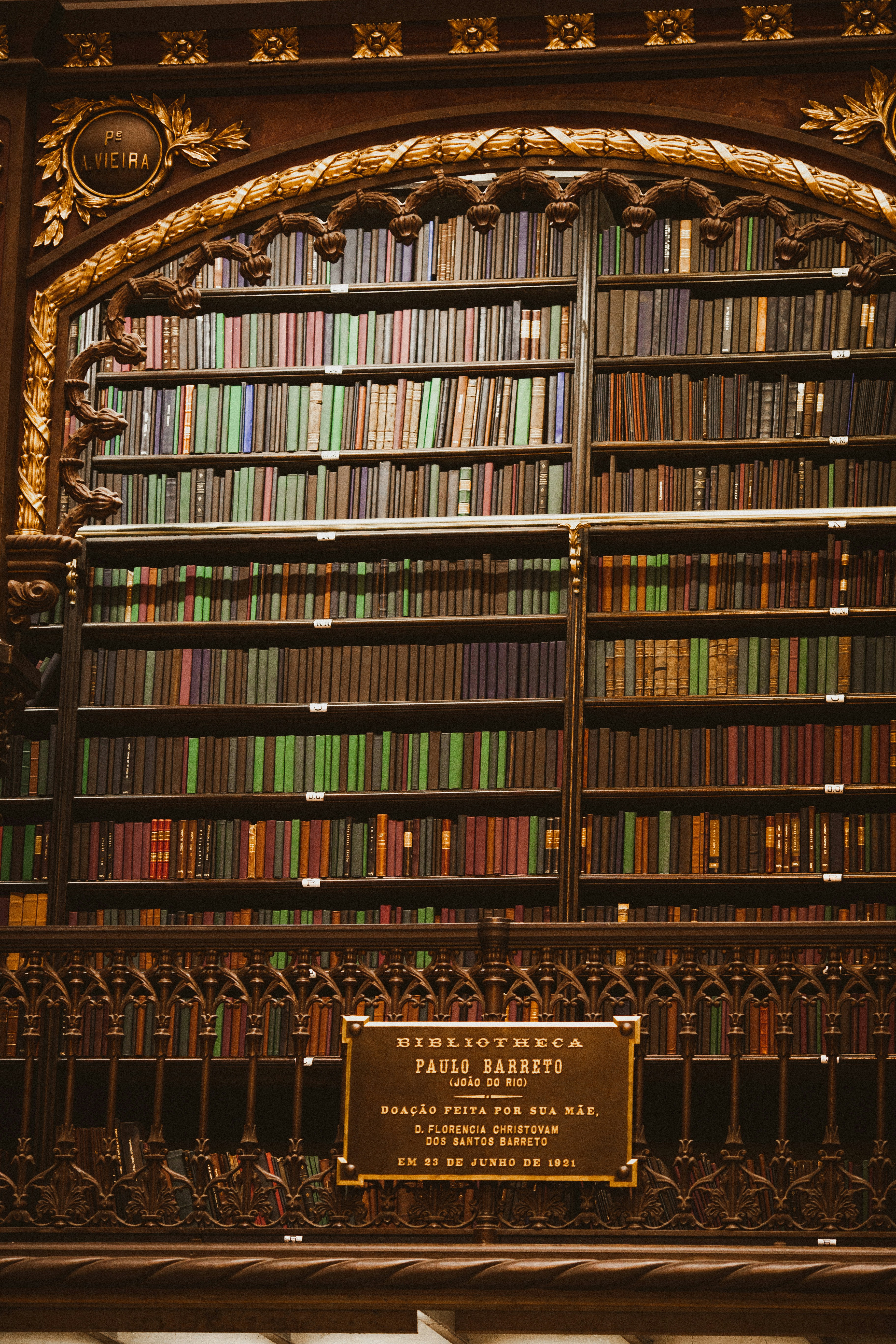 a large book shelf with many books