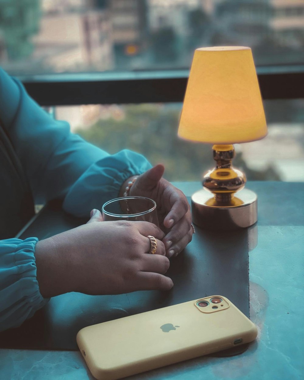 a person holding a glass