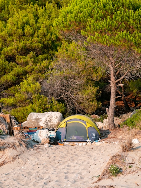 a tent in a rocky area