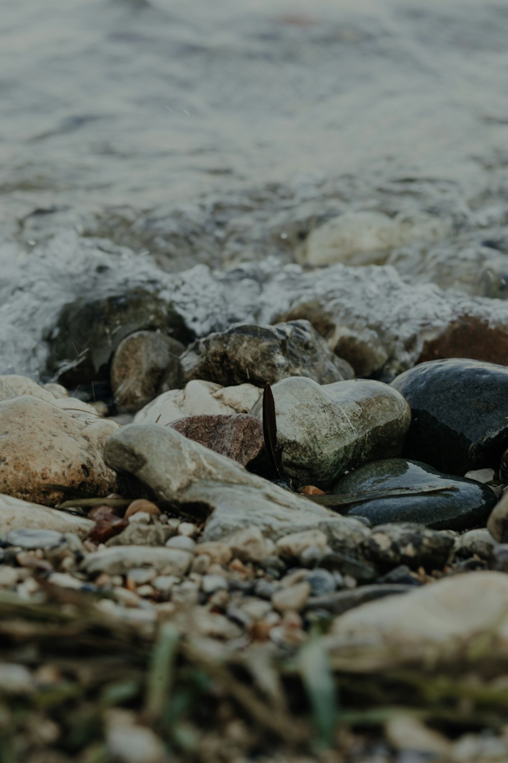 a group of rocks on a beach