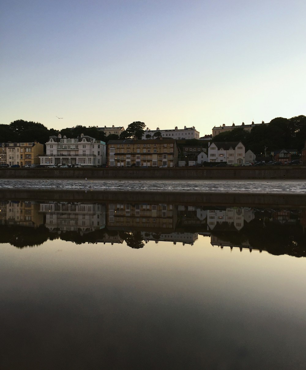 a body of water with buildings along it