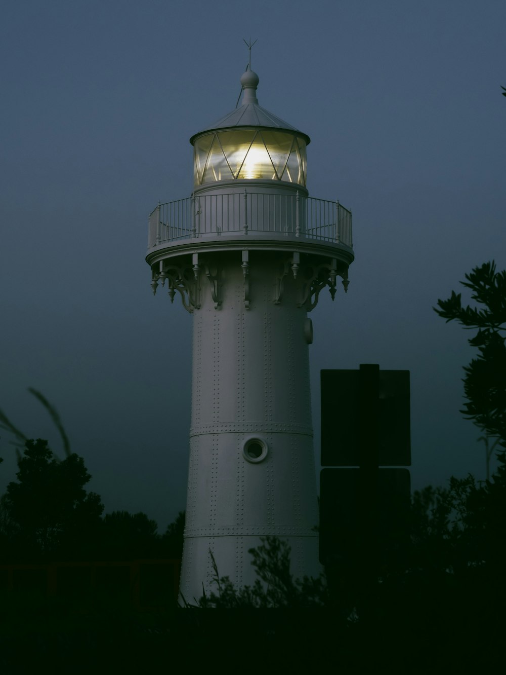 a light house with a light on top