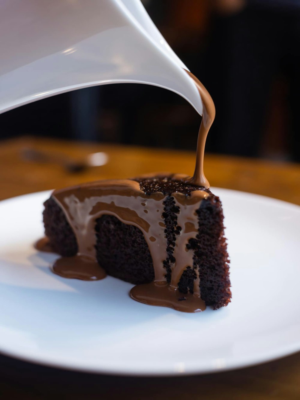 a chocolate cake with a spoon