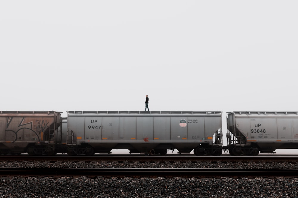 a person standing on a train