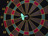 a dart board with darts