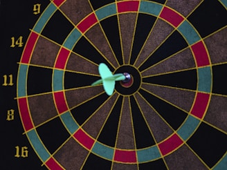 a dart board with darts