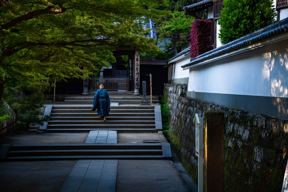 a person walking up a flight of stairs