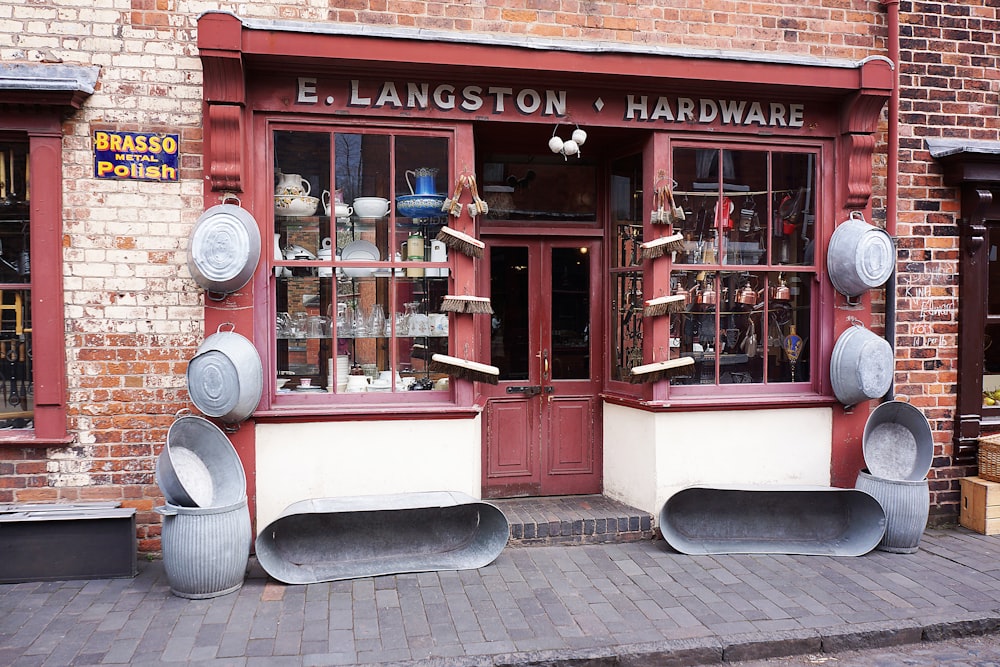 a store front with a red door