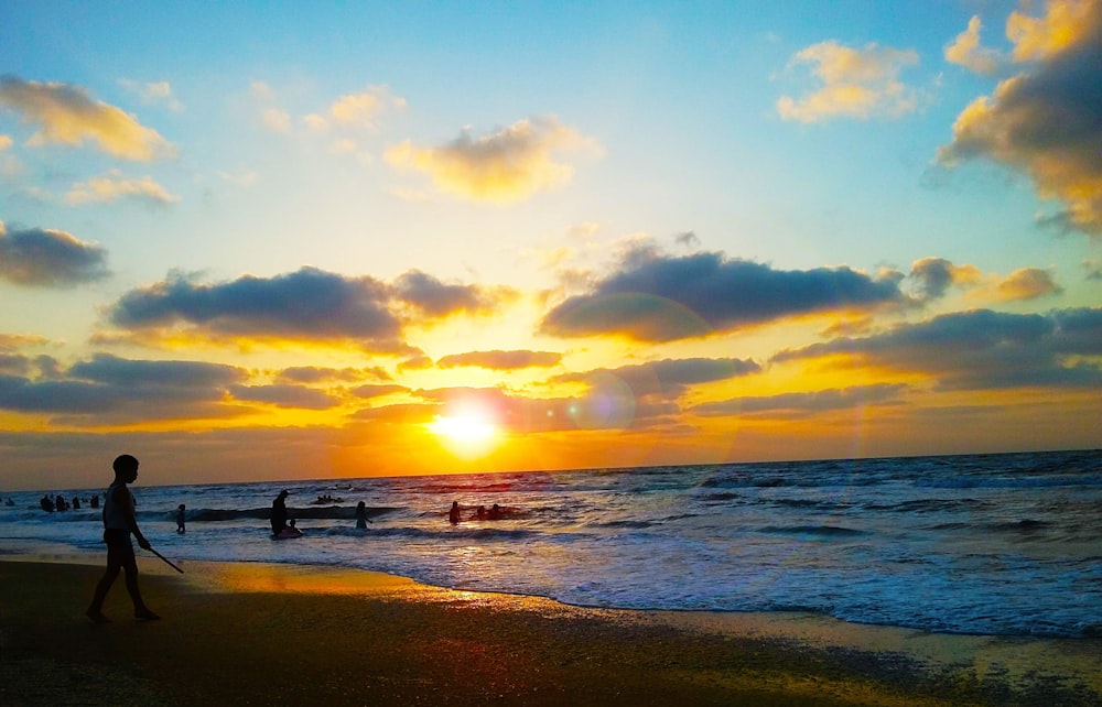 a group of people on a beach