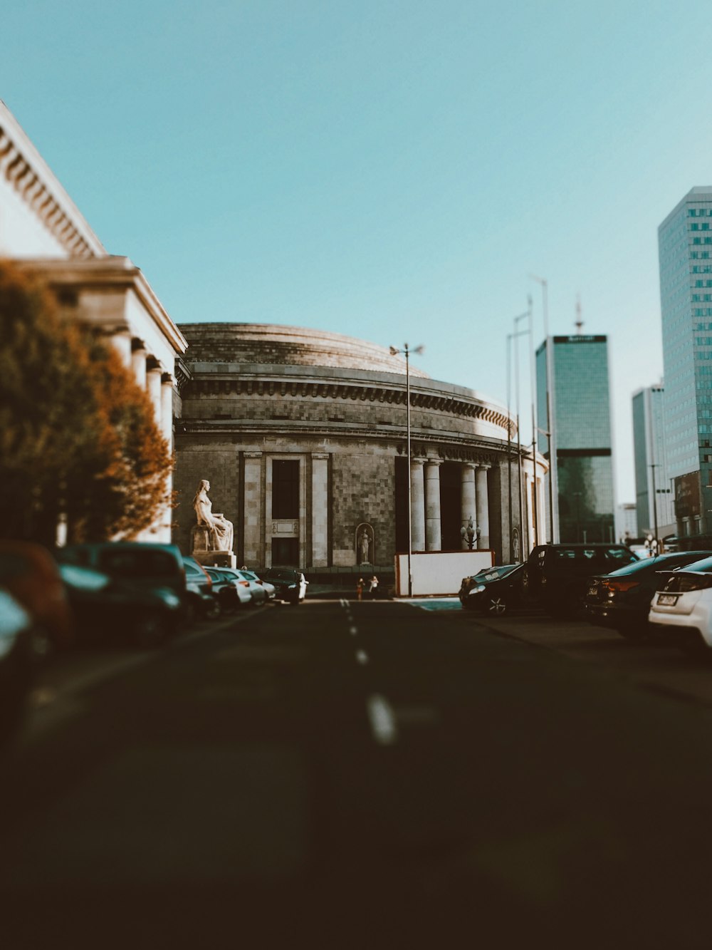 a street with cars and buildings