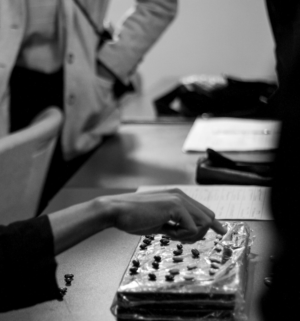 a person holding a cake