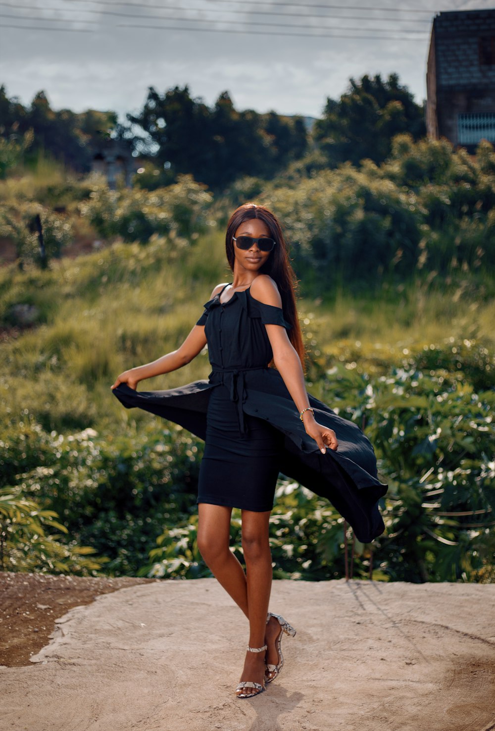 a woman in a black dress