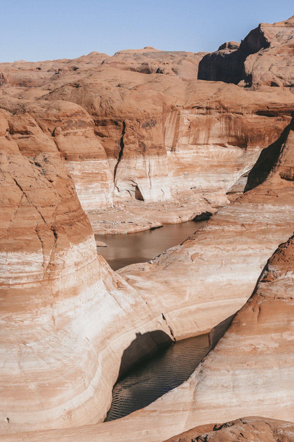 a large canyon with a hole in it