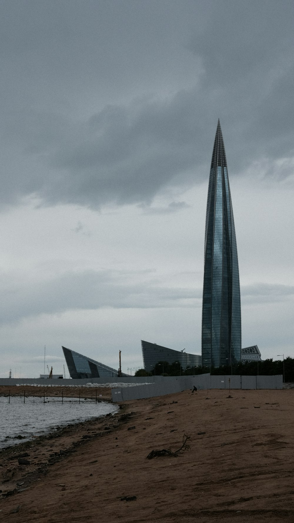 a tall building on a beach