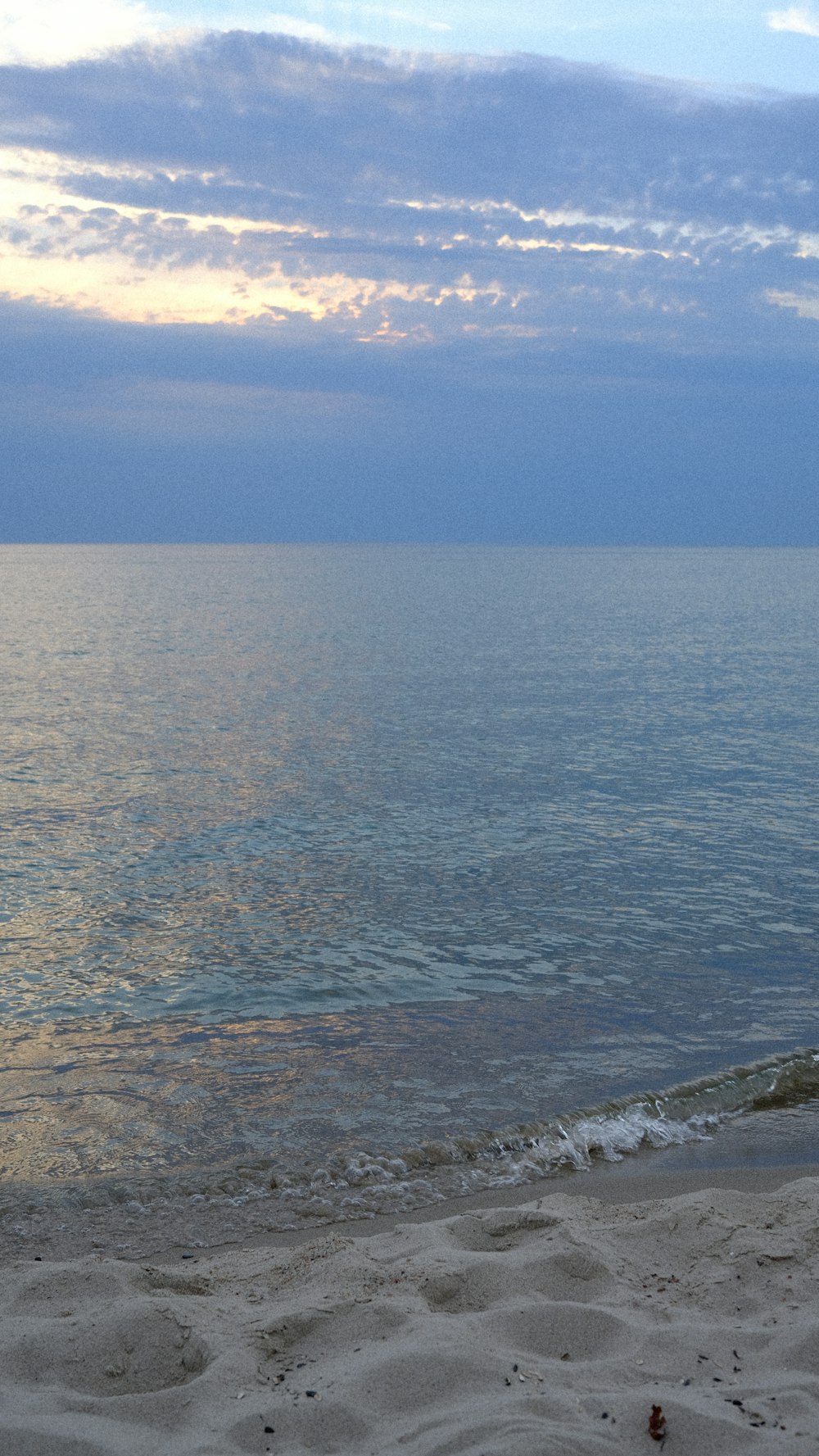 a beach with a body of water