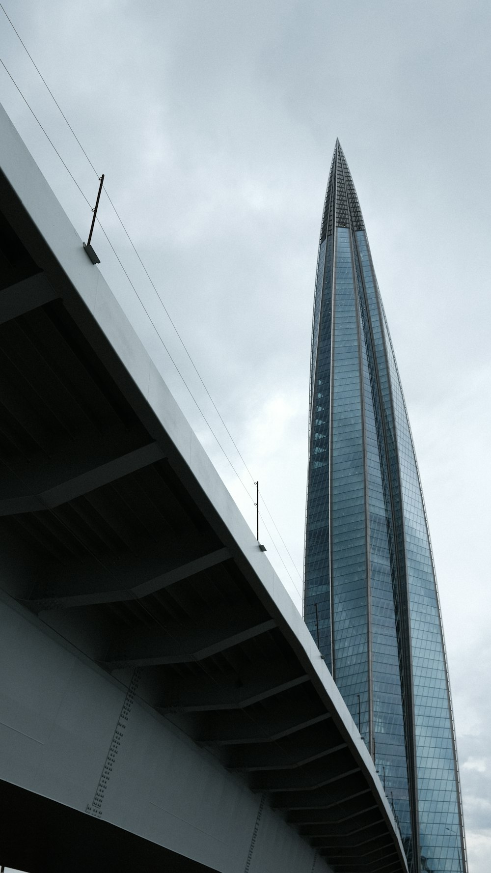 a tall building with a curved top