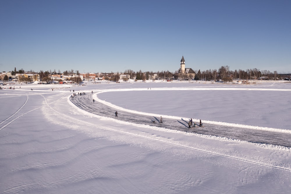 a group of people on a snowy field