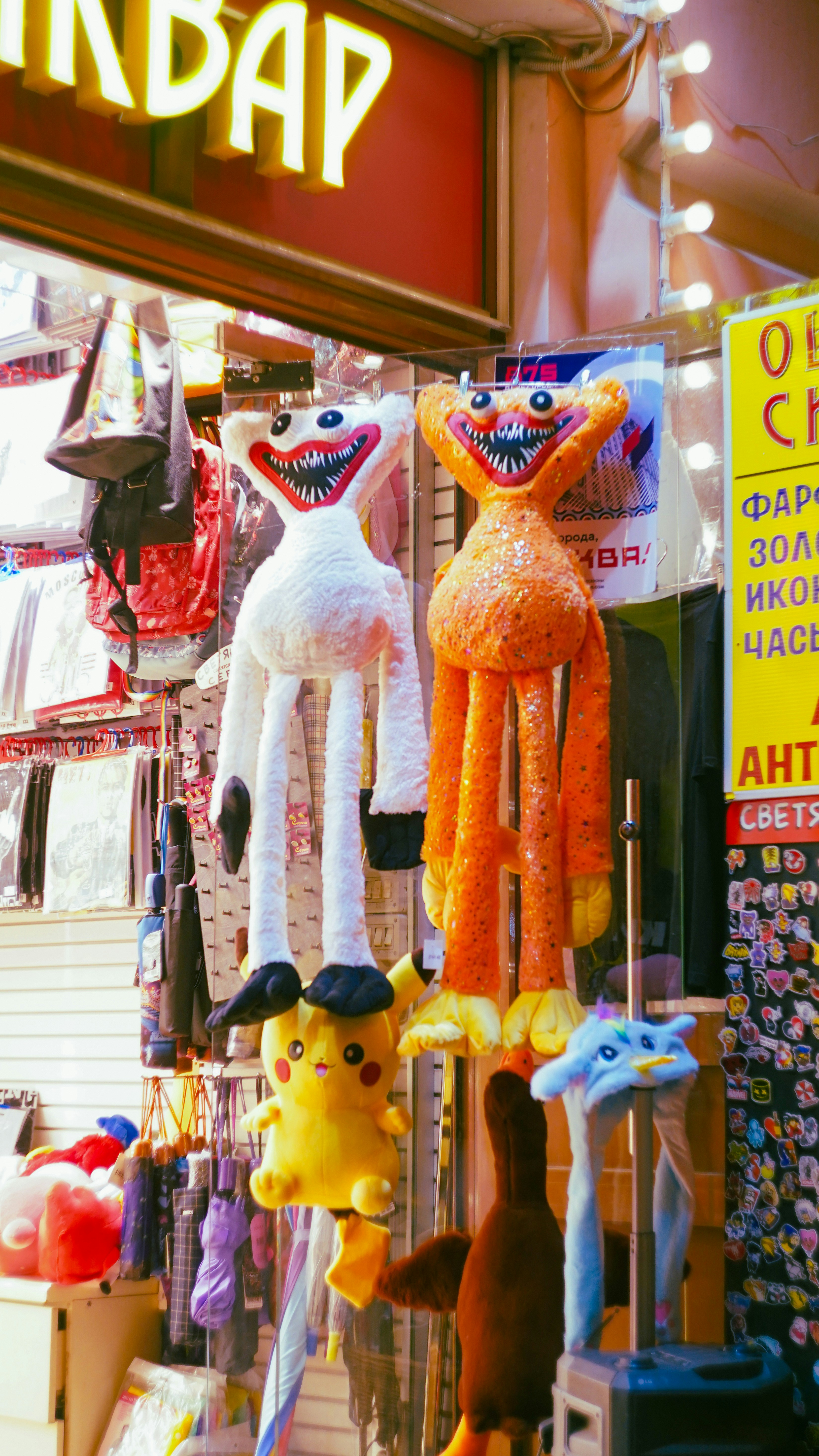 a group of stuffed animals in a store