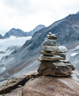 a stack of rocks on a mountain