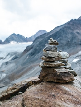 a stack of rocks on a mountain