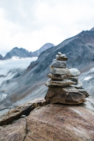 a stack of rocks on a mountain
