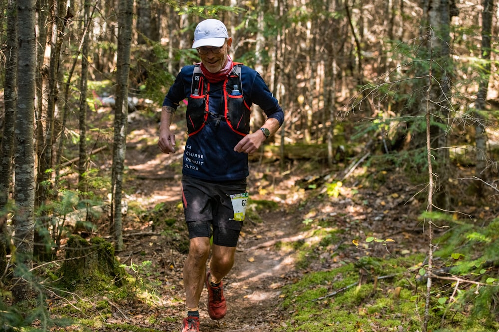 a man running in the woods