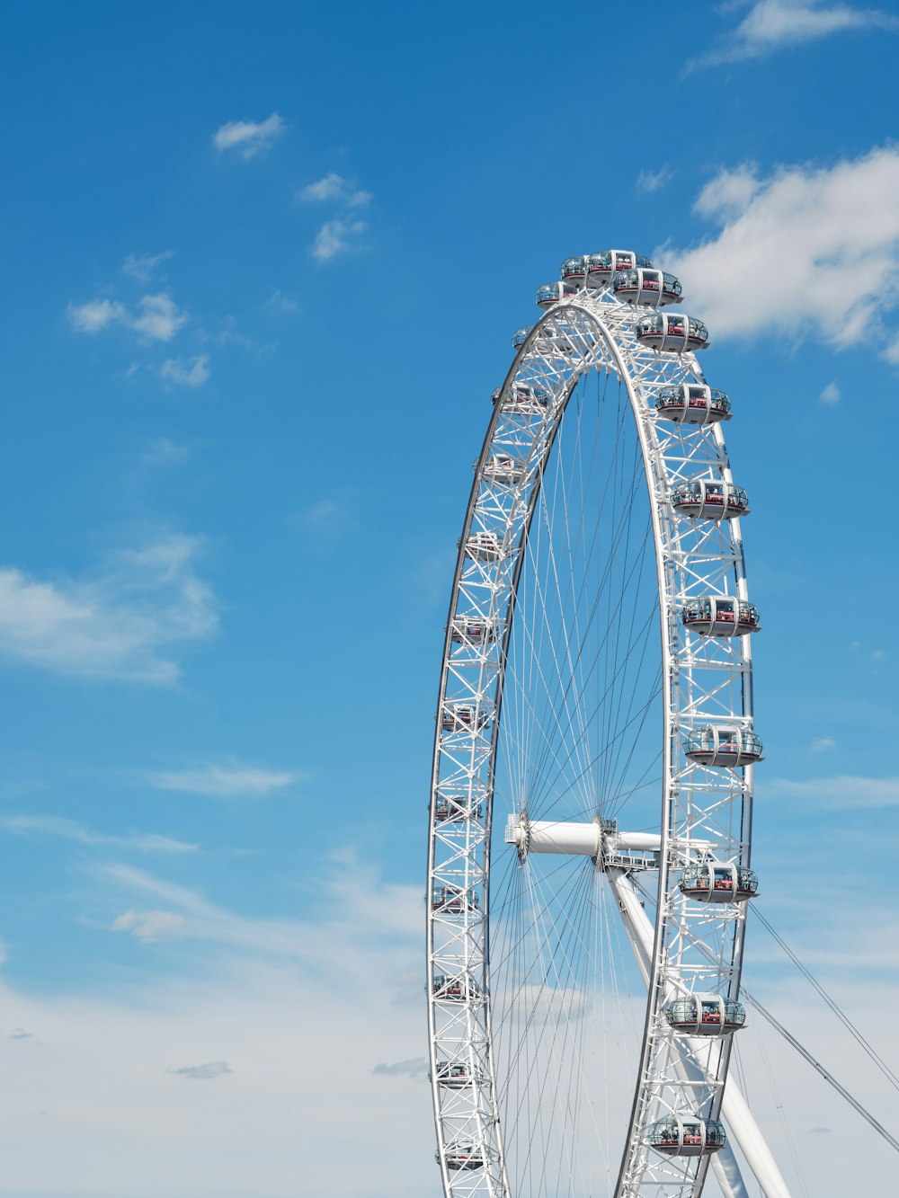 a roller coaster with a blue sky